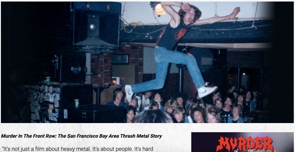 A man jumping in the air at an event.